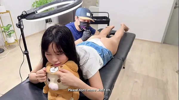 Watch a cute girl seduce her tattoo artist in free amateur porn